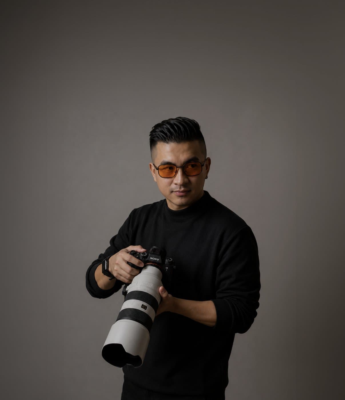 Fotógrafo de Photosport con su cámara